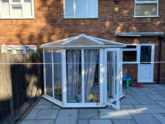 conservatory renovation required due to polycarbonate roof being worn out and plastics discolouring.