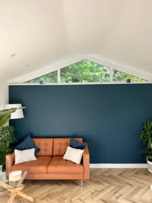 cold conservatory cosy living space interior blue wall